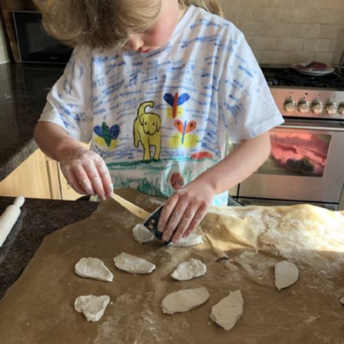 Designing t-shirts and making clay models